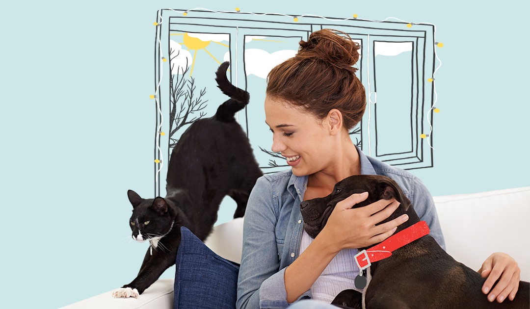 Woman sitting with her pets
